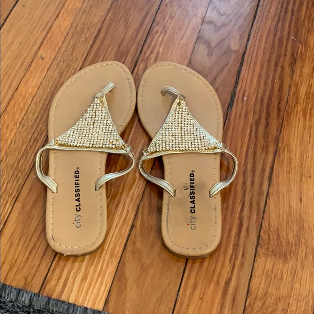 Tan and gold sandals with gold jewels. Size 5.5